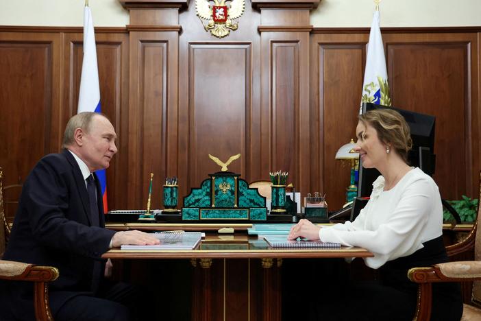 Russian President Vladimir Putin meets with Presidential Commissioner for Children's Rights Maria Lvova-Belova in Moscow, May 31.