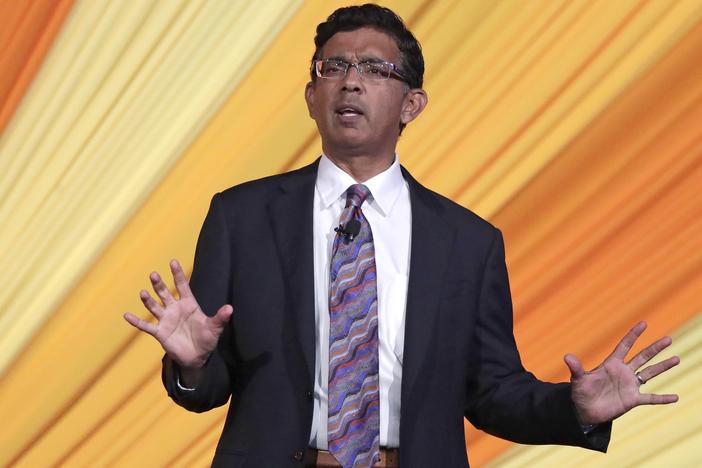 Author and filmmaker Dinesh D'Souza addresses the Republican Sunshine Summit on June 29, 2018, in Kissimmee, Fla.
