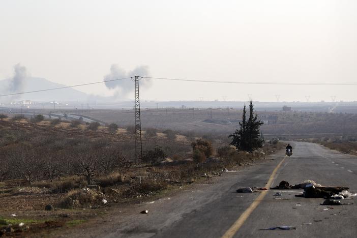 Smoke from fighting billows in the edges of the town of Hama, Syria, Tuesday Dec. 3, 2024.