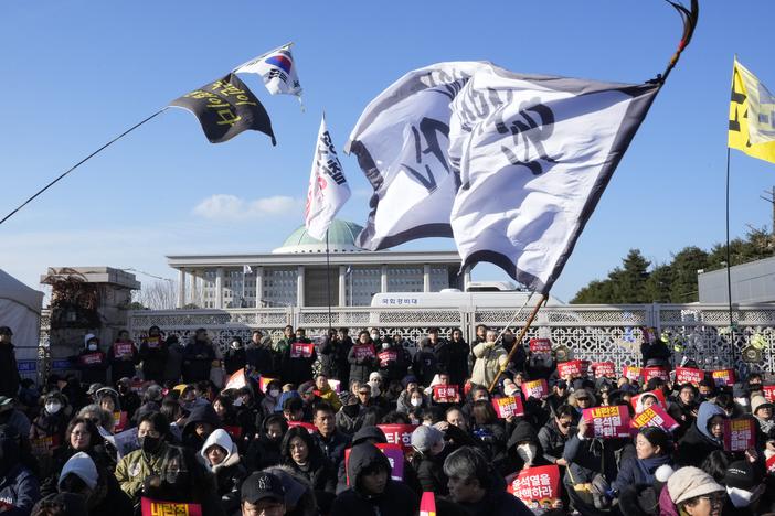 Protesters attend a rally demanding South Korean President Yoon Suk Yeol's impeachment, in front of the National Assembly in Seoul, South Korea, on Saturday.