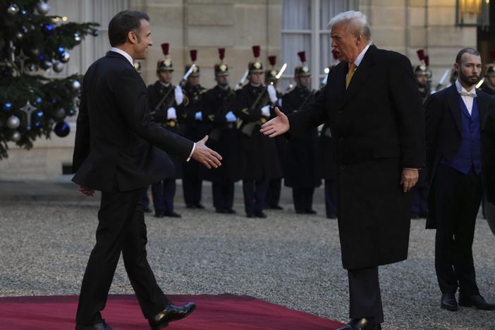 French President Emmanuel Macron, left, is to shake hands with President-elect Donald Trump as he arrives at the Elysee Palace, on Saturday.