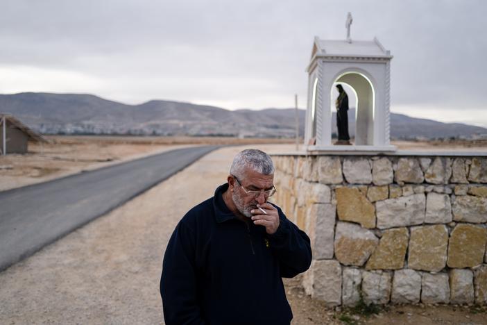 Rafaat Nasrallah smokes a cigarette in his village on the Syria-Lebanon border. "We are at the border," he says, "our roads lead to Syria, because for us Syria is my country as well as Lebanon."
