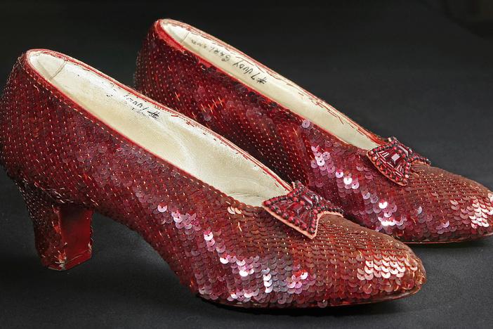 Sequin-covered ruby slippers worn by Judy Garland in <em>The Wizard of Oz</em> appear at the offices of Profiles in History in Calabasas, Calif. on Nov. 9, 2001.