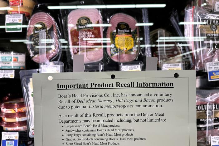 A recall notice citing listeria contamination risks is posted next to Boar's Head meats in a Safeway store in San Rafael, Calif., in July, as the deli meat company expanded its recall of ready-to-eat meat and poultry products.