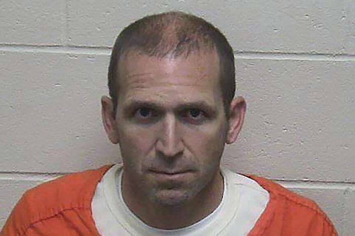 This photo released by the Green Lake County Sheriff's Office in Wisconsin shows Ryan Borgwardt's booking photo on Tuesday.