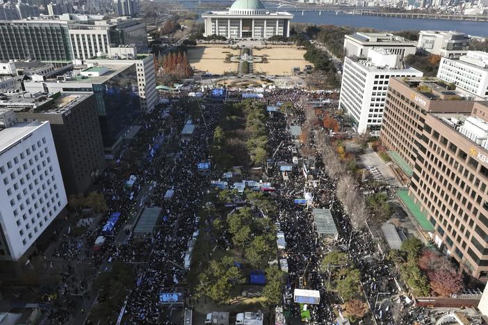 Participants gather during a rally to demand South Korean President Yoon Suk Yeol's impeachment outside the National Assembly in Seoul, South Korea, on Saturday.