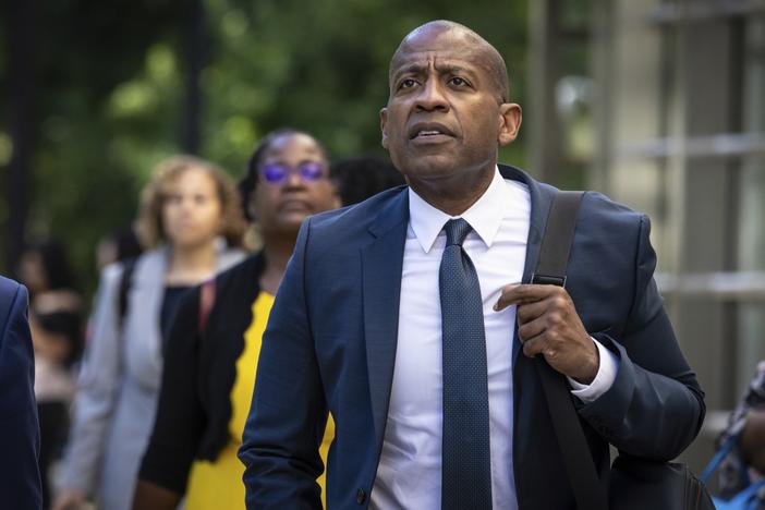 FILE - Carlos Watson leaves Brooklyn federal court after testifying in his own defense in New York, July 1, 2024.