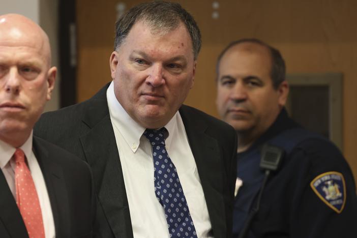 Rex Heuermann (center) charged in the Gilgo Beach serial killings on Long Island, appears for a hearing on July 30 at Suffolk County Court in Riverhead, N.Y.