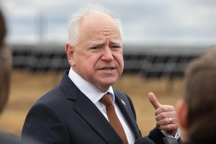 Minn Gov. Tim Walz answers reporters' questions Tuesday, Nov. 19, 2024 after a ceremony marking the completion of Xcel Energy's Sherco Solar 1 project northwest of Becker, Minn. The project is expected to provide power for as many as 150,000 homes.