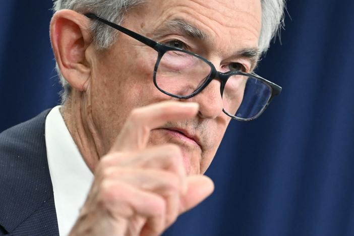 Federal Reserve Chair Jerome Powell and his colleagues lowered their benchmark interest rate Wednesday by a quarter percentage point. That will make it cheaper to get a car loan, finance a business or carry a balance on your credit card.