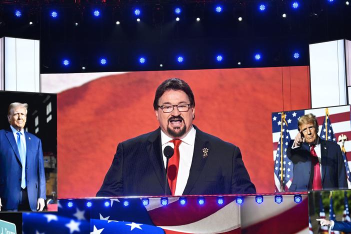 Nevada Republican Party Chair Michael McDonald, one of the 2024 presidential electors facing felony charges related to the 2020 "fake electors" scheme, speaks during the Republican National Convention at the Fiserv Forum in Milwaukee in July.