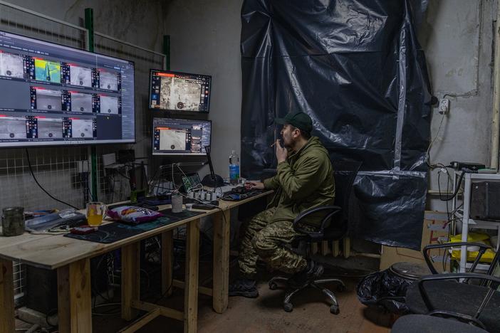 Callsign "Sonic", 34, a сommander of the strike unmanned aerial vehicle platoon, known as Dovbush's hornets, a unit of 68th Separate Jäger Brigade.  He watches the live streams of drone pilots operating in the Donbas Region on Dec. 19, 2024.