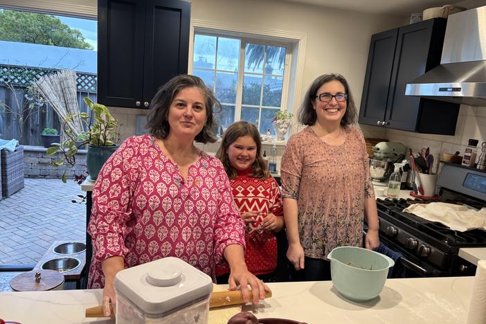 The Weiss-Pires family — Lynda, Lillian and Bessie — enjoy baking Christmas and Hanukkah treats during the holiday season in their kitchen in Oakland, Calif.