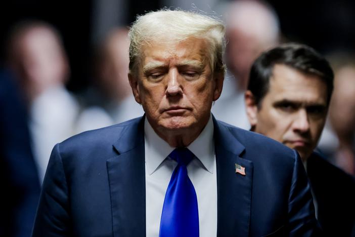Former President Donald Trump departs the courtroom after being found guilty on all 34 counts in his hush money trial at Manhattan Criminal Court on May 30 in New York City.