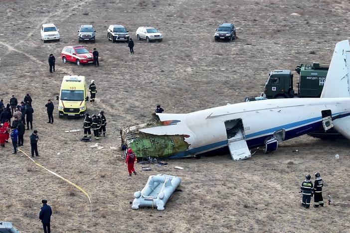 The wreckage of Azerbaijan Airlines Embraer 190 lays on the ground near the airport of Aktau, Kazakhstan, on Wednesday.<br>