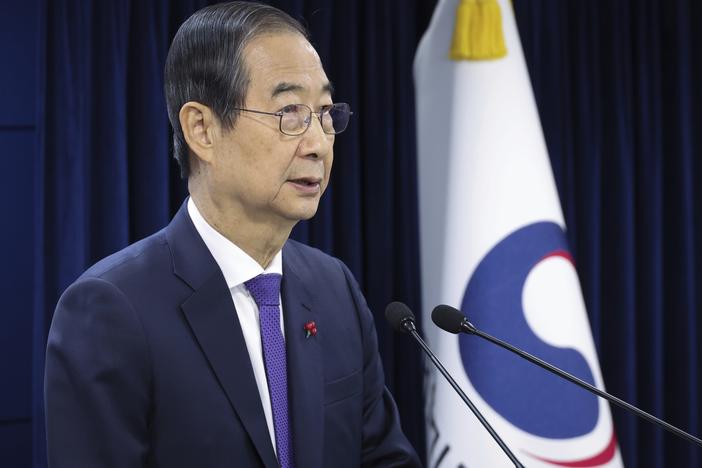 South Korean acting President Han Duck-soo speaks at the government complex in Seoul, South Korea, Thursday, Dec. 26, 2024.