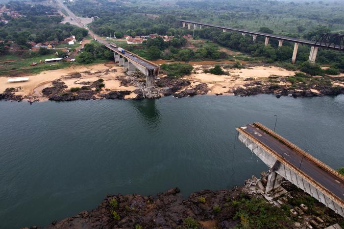 The Juscelino Kubitschek Bridge, which collapsed into the Tocantins River in Estreito, Maranhao state, Brazil, is shown on Tuesday. Several cars and trucks crossing the bridge when it collapsed on Sunday fell into the river, killing nine people. Others are still missing.
