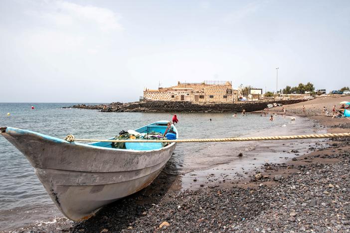 This photograph shows a boat that arrived with 41 people on board, including two minors, on the Canary island of Tenerife in July 2023.