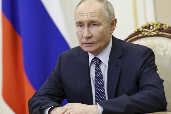 Russian President Vladimir Putin chairs a Security Council meeting via videoconference at the Kremlin in Moscow, on Saturday.