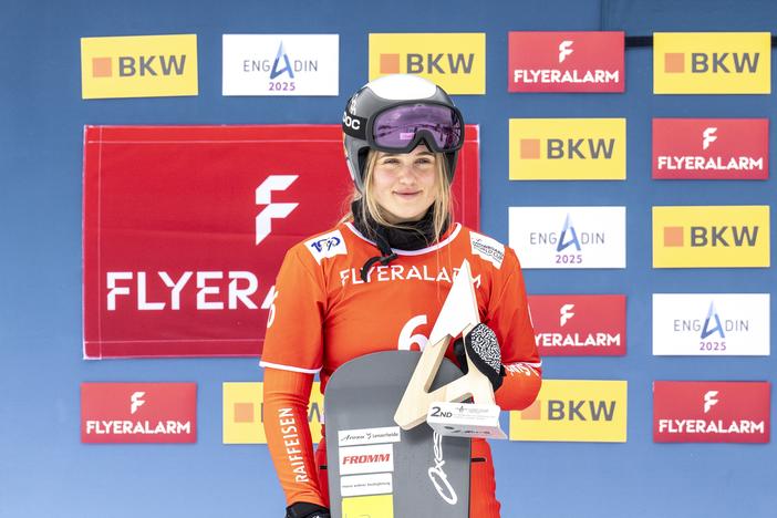 Sophie Hediger takes 2nd place during the FIS Snowboard Cross World Cup Men's and Women's Snowboard Cross on Jan. 26, 2024, in St. Moritz, Switzerland.