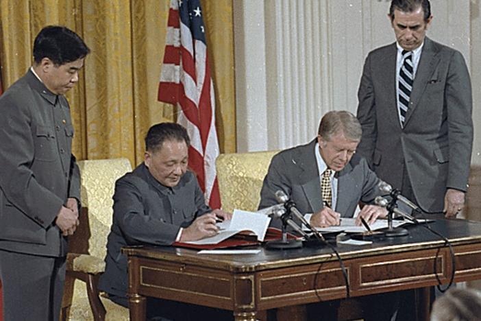 China's then-paramount leader Deng Xiaoping and President Jimmy Carter sign historic diplomatic agreements between the United States and China in 1979.