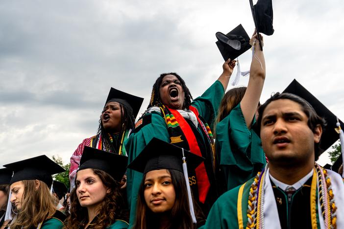 Graduating students protests remarks by Washington University Chancellor Andrew Martin on May 13, at the university's campus near Clayton, Mo. Full story <a href="https://www.stlpr.org/education/2024-05-13/st-louis-washington-university-graduation-israel-palestine-war-protests"target="_blank"   >here</a>.