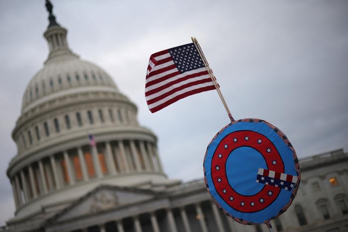A QAnon sign at the U.S. Capitol on Jan. 6, 2021. Many of the rioters who attacked the Capitol later told investigators they were motivated in part by the online conspiracy theory.