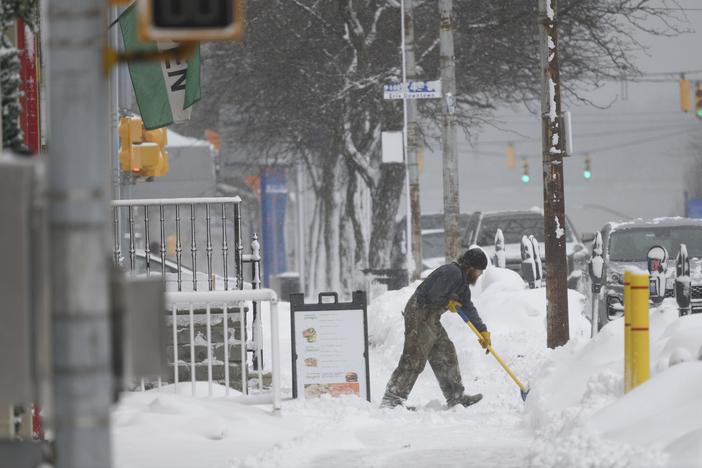 A cold front, combined with potential lake-effect snow — as seen here in Erie, Pa., in December — could bring freezing temperatures and travel disruptions to much of the central and eastern United States.