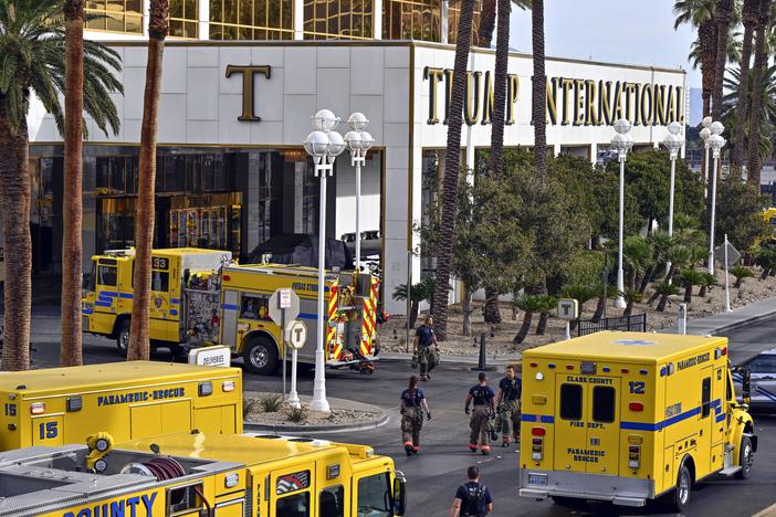 Fire vehicles surround the valet area where a Tesla Cybertruck caught fire at the Trump International Hotel in Las Vegas on Jan. 1.