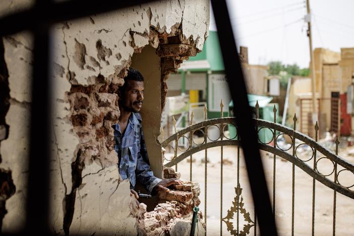 A police officer looks through damage caused by a shell at the Omdurman Maternity Hospital in Omdurman, Sudan, on Sept. 7. <a href="https://www.npr.org/2024/11/01/nx-s1-5168376/sudan-khartoum-ombdurman-war-africa"target="_blank"   >Click here for the full story. </a>