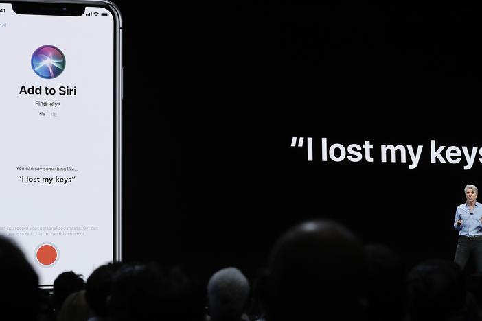 Craig Federighi, Apple's senior vice president of Software Engineering, speaks about Siri during an announcement of new products at the Apple Worldwide Developers Conference in San Jose, Calif., June 4, 2018.