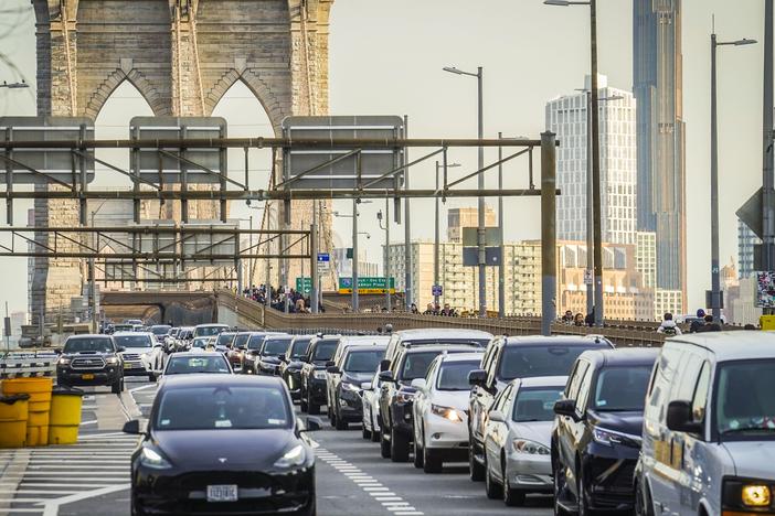 Traffic enters lower Manhattan after crossing the Brooklyn Bridge, Feb. 8, 2024, in New York.