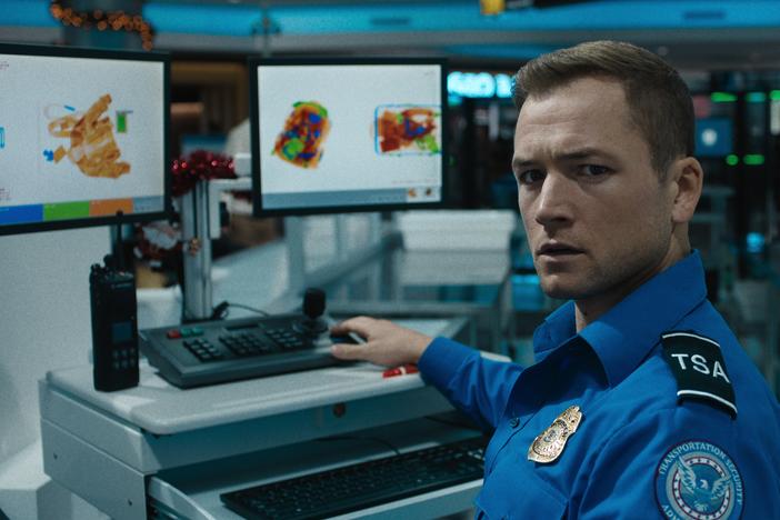 Taron Egerton as Ethan Kopek in <em>Carry-On</em>.
