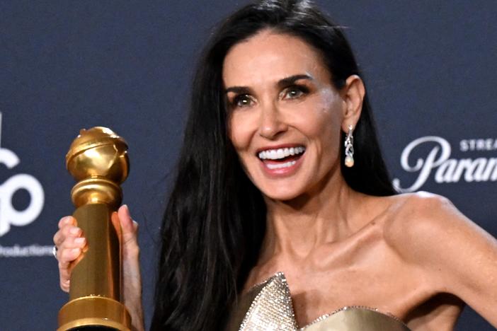 Demi Moore poses in the press room during the 82nd annual Golden Globe Awards on Sunday night.
