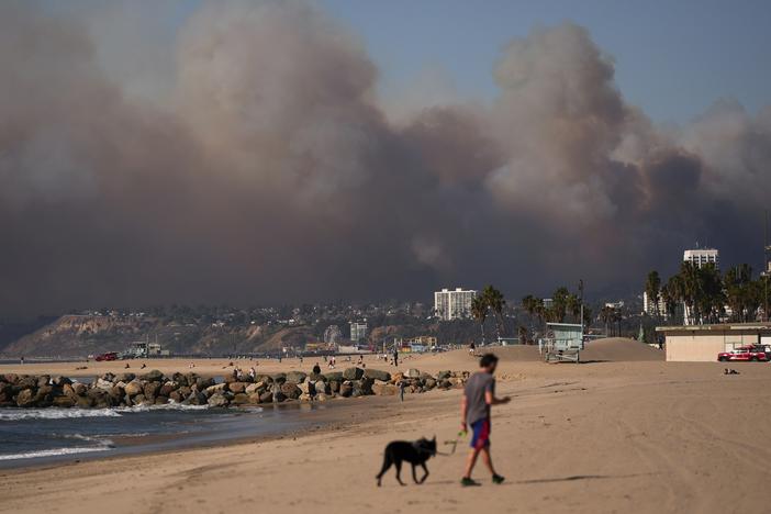 Smoke from a wildfire blankets the sky above Venice Beach in Los Angeles. Air quality in the region is unhealthy because of several wildfires.