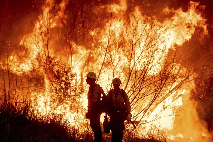 Fire crews battle the Kenneth Fire in the West Hills section of Los Angeles, Thursday, Jan. 9, 2025.