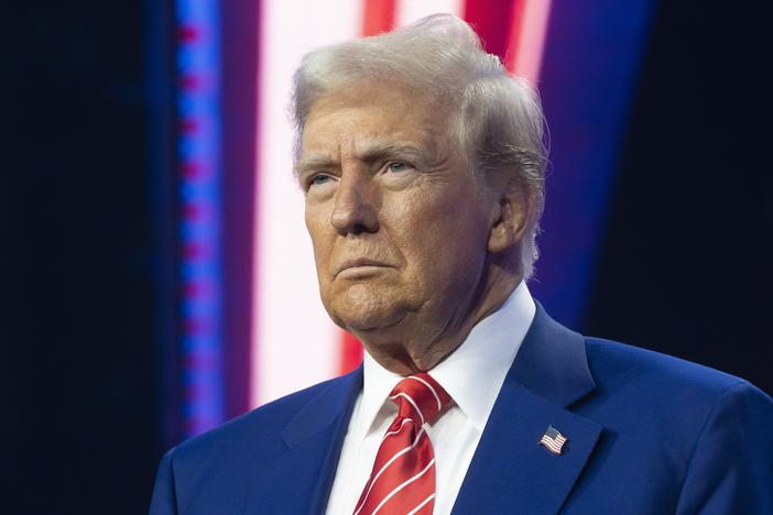 President-elect Donald Trump looks on during Turning Point USA's AmericaFest at the Phoenix Convention Center in December 2024 in Phoenix, Ariz.