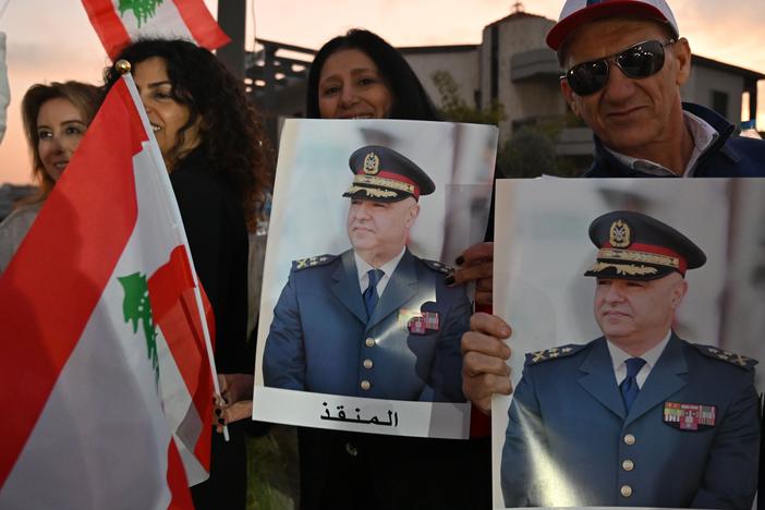 People gather to celebrate after Lebanese parliament elects army chief Joseph Aoun new president, on Thursday, in Beirut, Lebanon.