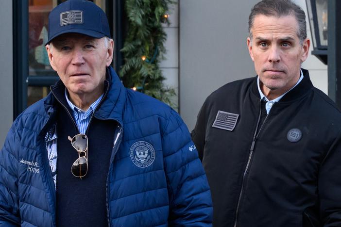 A Nov. 29, 2024, photo shows President Biden and son Hunter Biden stepping out of a bookstore while shopping in Nantucket, Mass.