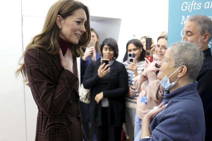 Britain's Princess Kate (left) talks with Rebecca Mendelhson during a visit to The Royal Marsden Hospital in London on Tuesday.