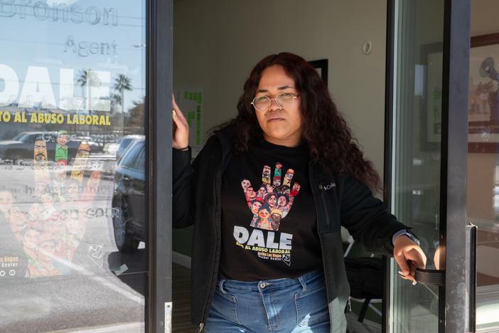 Labor organizer Karin Martinez stands in the doorway at the Arriba Las Vegas Worker Center in Las Vegas, Nev., on January 13, 2025.