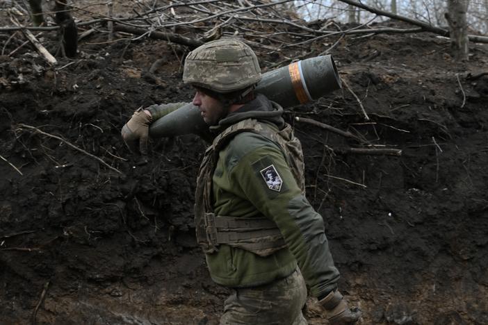 An artilleryman of the Ukrainian armed forces prepares to fire a French-made Caesar self-propelled howitzer toward Russian positions in the Donetsk region on Jan. 6.
