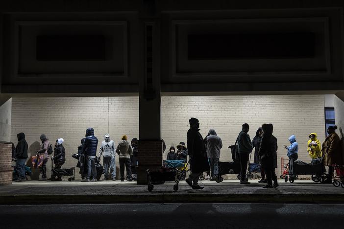 At the No Limits food pantry in Landover, Md., the line of people waiting to get in on Dec. 6, 2024, stretches to the street and down the block.