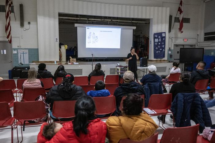 Amica Center for Immigrant Rights (formerly known as CAIR Coalition) attorney, Atenas Burrola Estrada speaks during an presentation on immigration enforcement at a school in Washington, DC on January 10, 2025.
