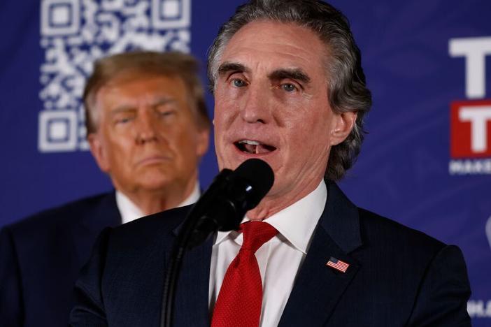 Doug Burgum encourages voters to support Donald Trump during a campaign rally in January 2024 in Laconia, N.H. Burgum ran against Trump for the Republican presidential nomination but later dropped out and endorsed him.