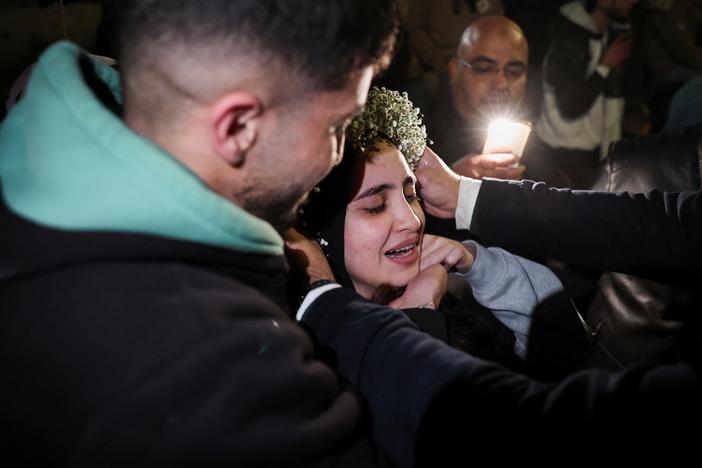 A freed Palestinian prisoner is greeted after their release from an Israeli jail as part of a hostages-prisoners swap and a ceasefire deal in Gaza between Hamas and Israel, in Ramallah, in the Israeli-occupied West Bank Jan. 20, 2025.