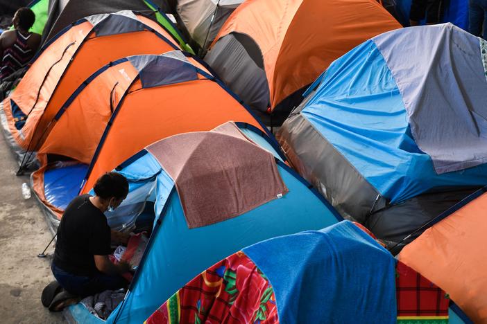 Migrant families live in tents at the Movimiento Juventud 2000 shelter in Tijuana, Mexico, back in April 2022, when the U.S. border restrictions known as Title 42 and "Remain in Mexico" were still in effect.