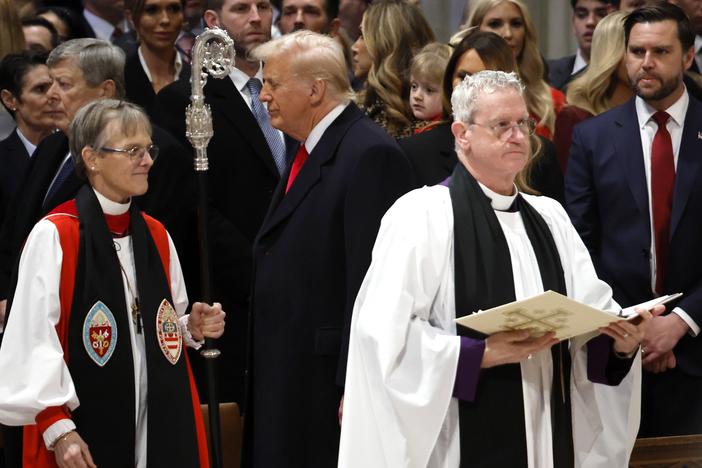Bishop Mariann Edgar Budde arrives as President Donald Trump and Vice President J.D. Vance look on during the Service of Prayer for the Nation Prayer Service at Washington National Cathedral on Tuesday.