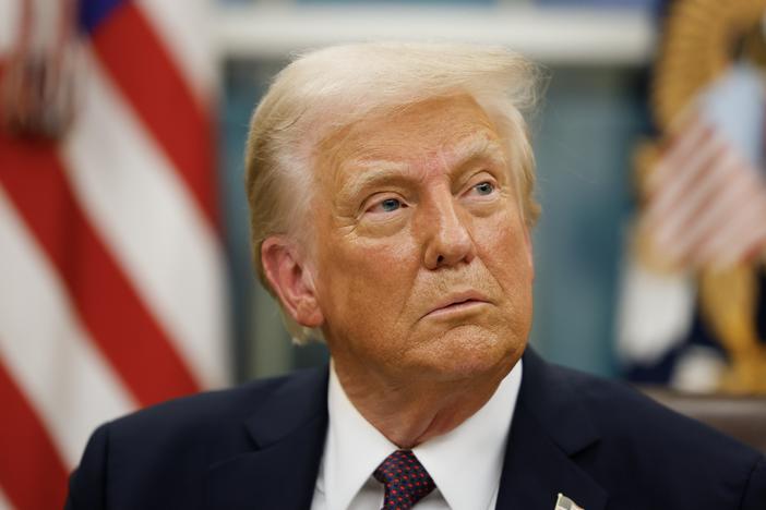 President Trump signs executive orders in the Oval Office on Jan. 20, 2025 in Washington, D.C.