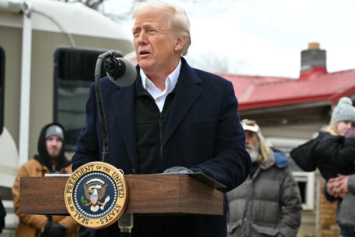 President Trump gets a briefing from officials in North Carolina about the recovery from Hurricane Helene in a hangar in Asheville, N.C. on Jan. 24, 2025.